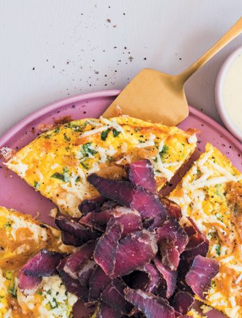 Caramelised onion, biltong and coriander frittata with mature Cheddar sauce