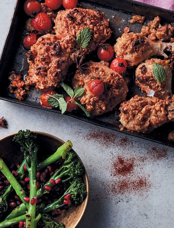 Roasted hummus and peanut crusted chicken with cherry tomatoes and broccolini