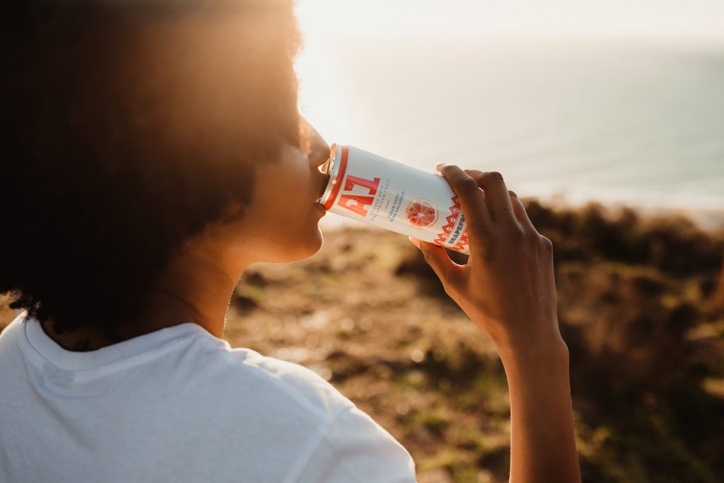 Woman drinking A1 Fruit Water