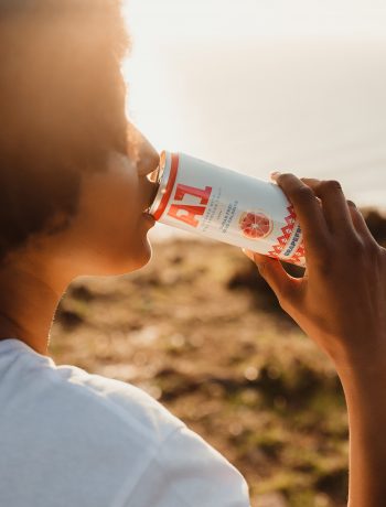 Woman drinking A1 Fruit Water