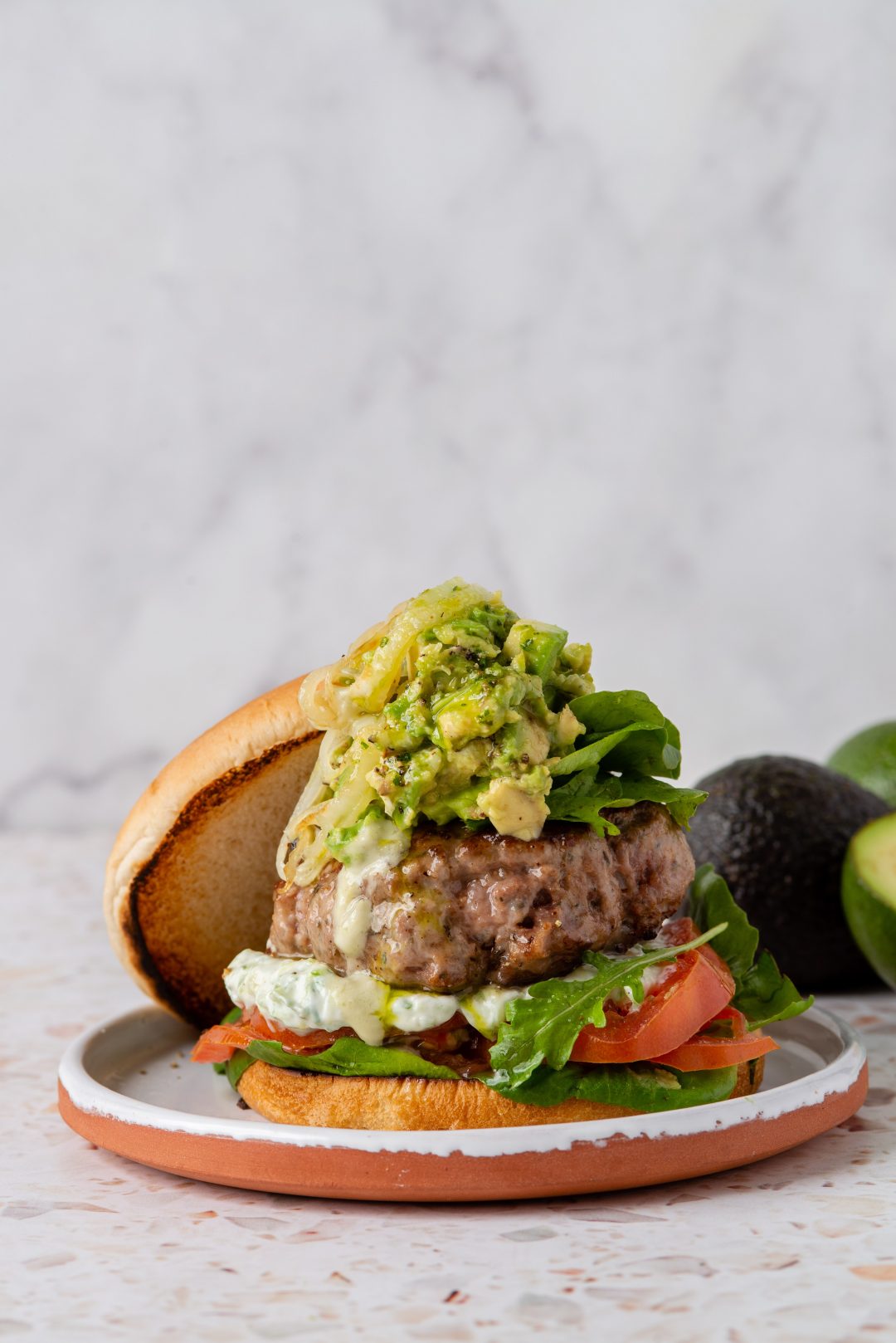 Greek-inspired cheats lamb burger with avo