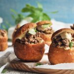 Vetkoek with lamb and hummus