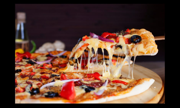 A cheesy pizza with many topping from Butlers Restaurant & Bar - Hillcrest Restaurants