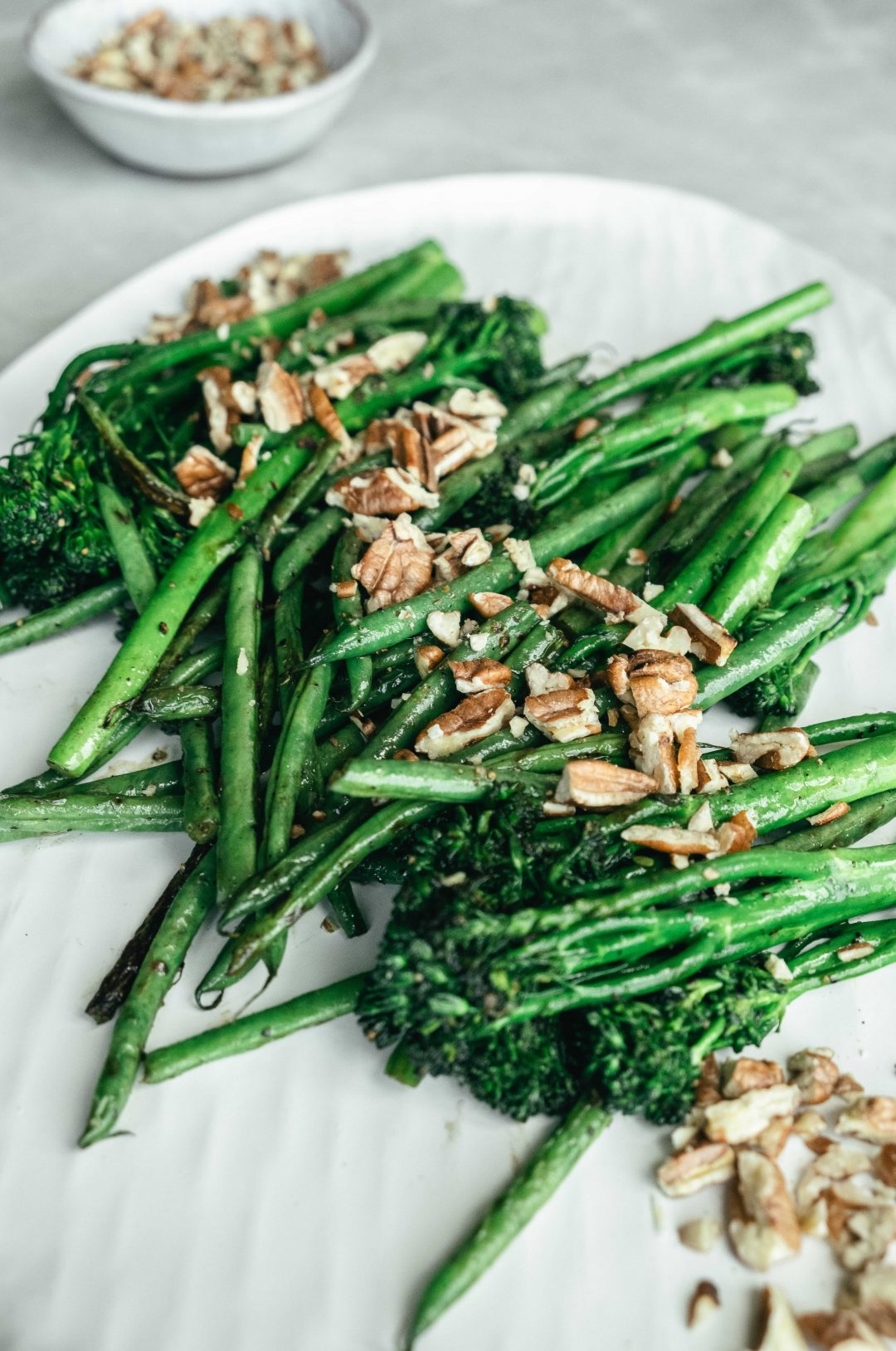 Seared greens with pecan nuts 1