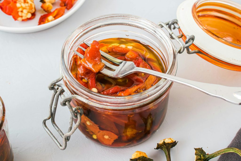 a jar of pickled chillies
