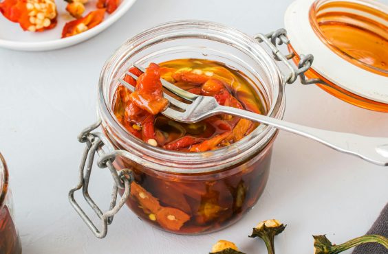 a jar of pickled chillies