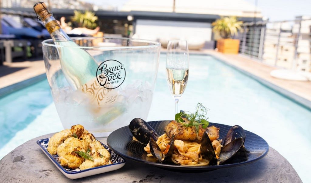 Bruce Jack Bumble Bee Moscato with Seafood on the pool deck at Jack@SKYE Rooftop Bar