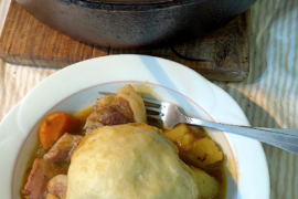 lab stew with garlic butter-stuffed dombolo