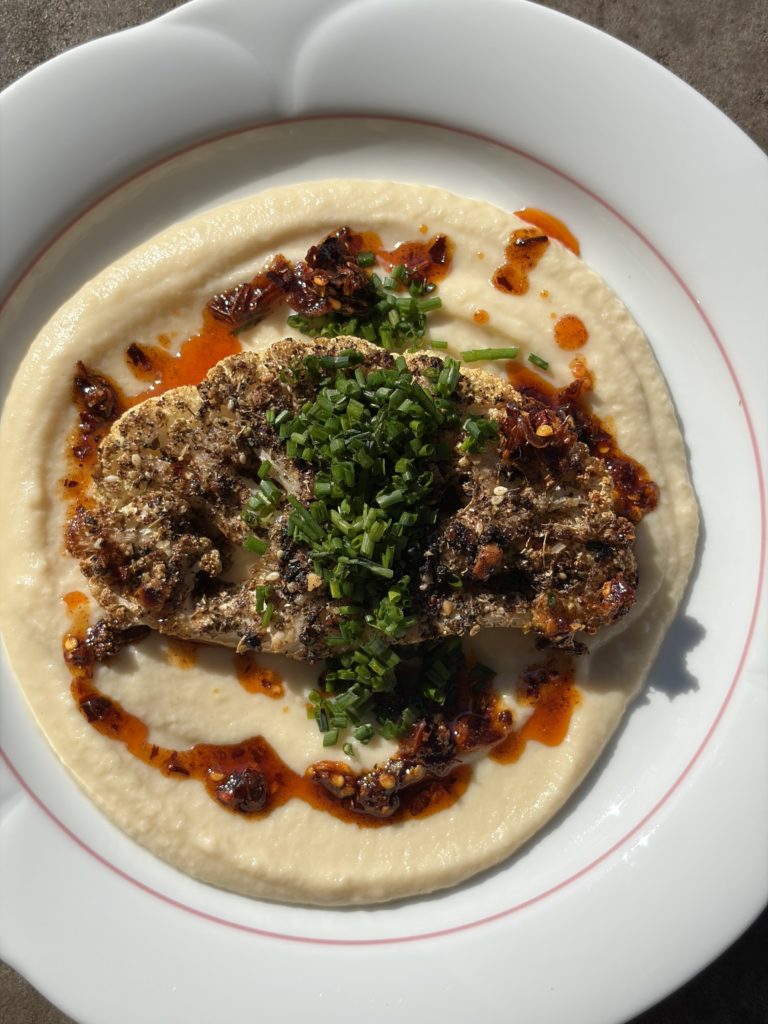 Macadamia za’atar-crusted cauliflower steaks with butter bean purée macadamia za'atar-crusted cauliflower steaks